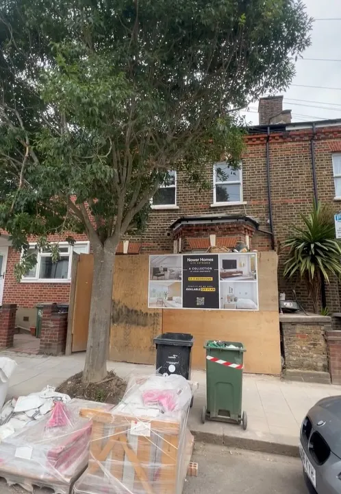 Lewisham property during building works, with materials stacked outside